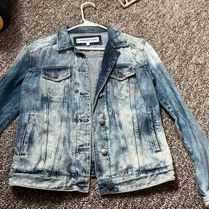 Distressed jean jacket